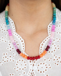 Resin beaded Necklace in warm rainbow hues including reds, purples and blues by Kaleidoscope Living