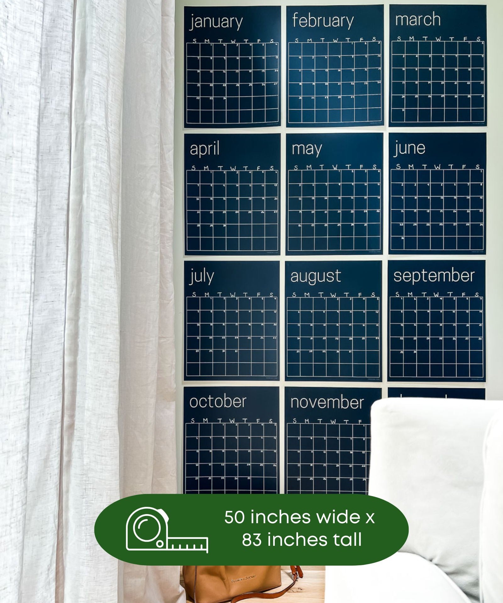 image showing navy blue reusable wall calendar hanging on a wall with text overlay that shows measurement of 4 feet wide by 7 feet tall